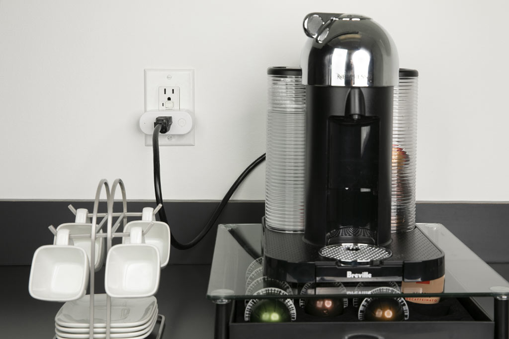 Shelly Plus Plug US with a plugged-in coffee maker